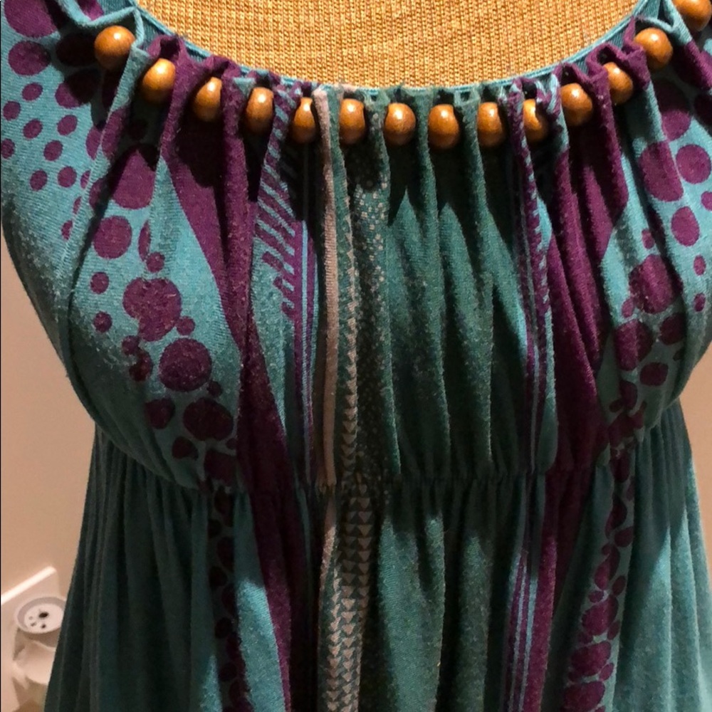 Halter dress w wood bead detail.